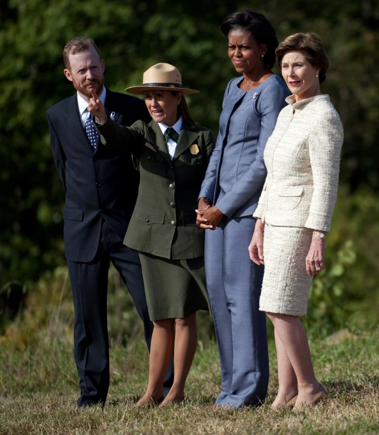 Image: First Lady Michelle Obama (2nd R) and fo